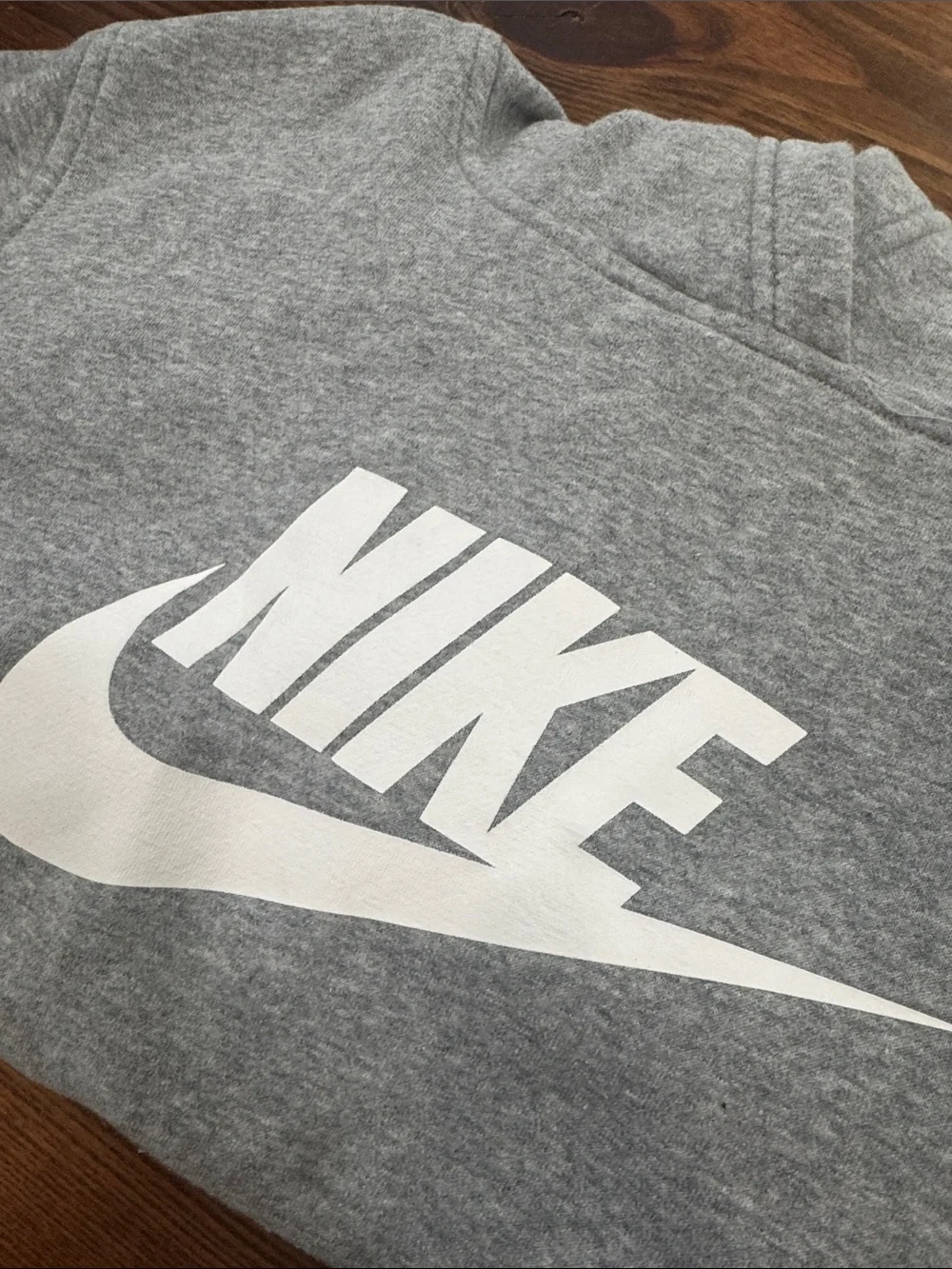 Kids Nike Heather Gray Hoodie with White Swoosh. Size XL